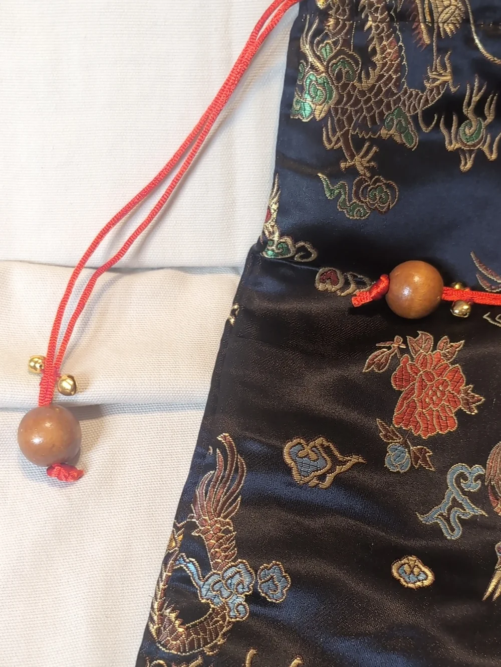 Silk Embroidered Black Drawstring Long Pouch